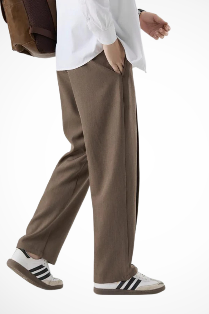 Classic men's tailored trousers with a modern wide leg and elegant pleats, perfect for dressy occasions.