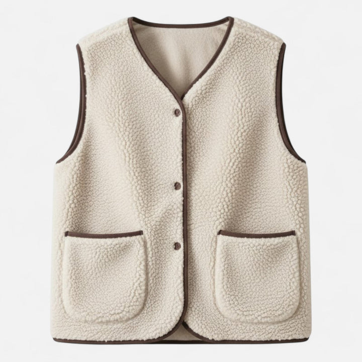 Men's plush cashmere-blend knit vest, a soft and warm sleeveless layering piece for fall and winter fashion.