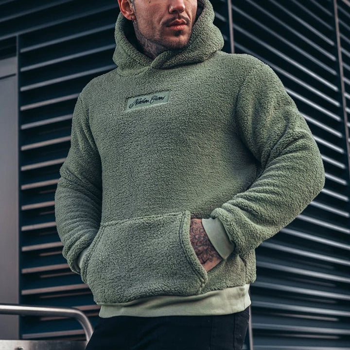 Men's plush pullover hoodie, perfect for ultimate warmth & comfort. Ideal casual fall/winter wear & loungewear.
