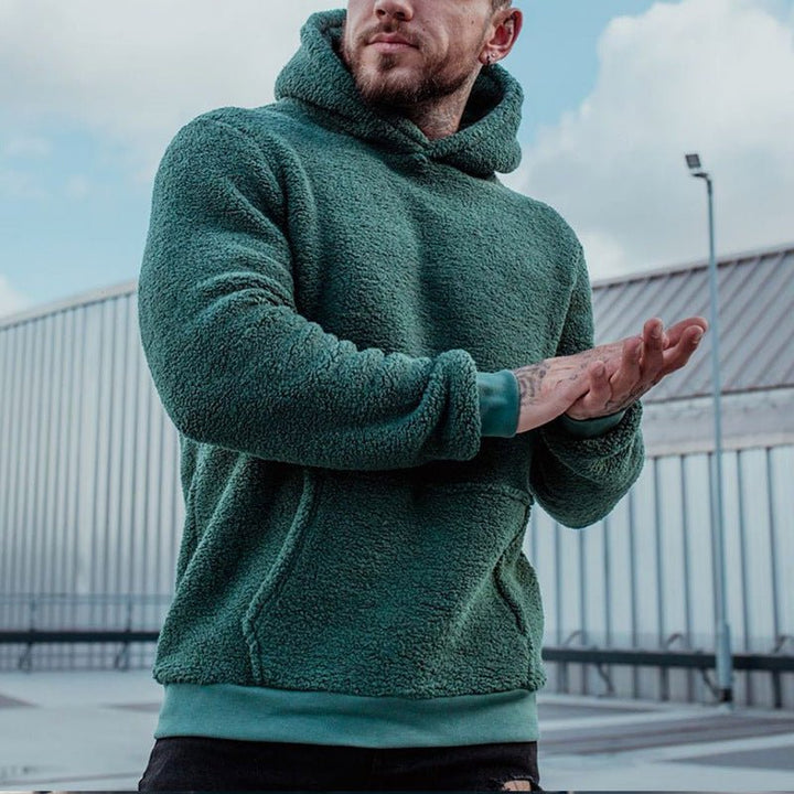 Cozy men's hooded sweatshirt with a relaxed fit, plush fabric. Great for casual comfort, fall & winter warmth.