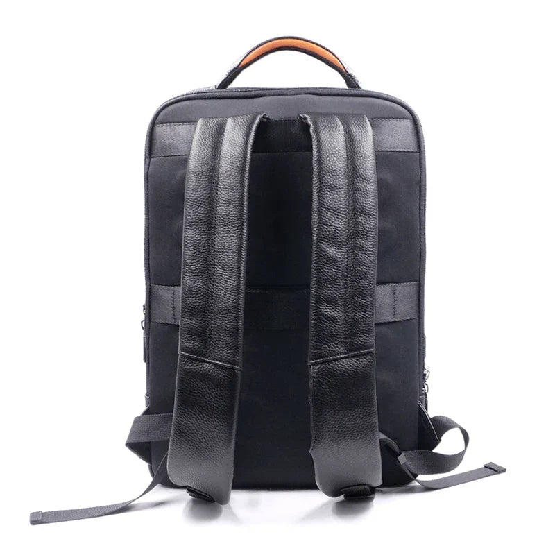 Durable men's genuine leather anti-theft backpack, perfect for daily use, travel, and secure storage.