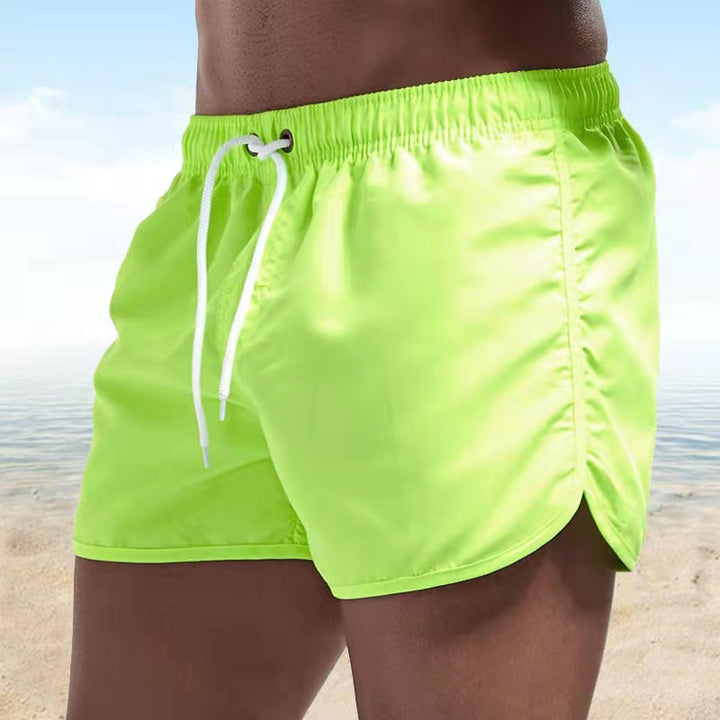 Men's casual beach shorts, quick-drying fabric & adjustable waist for ultimate summer comfort.
