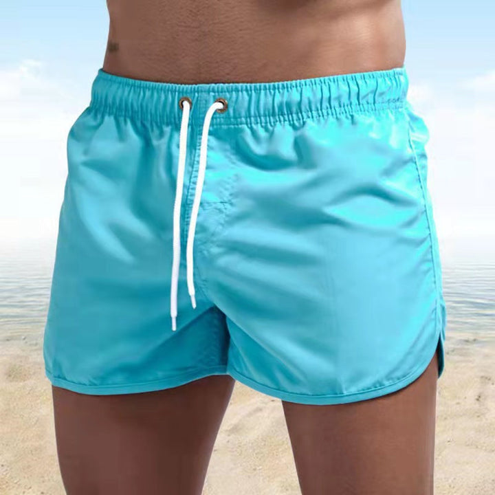 Comfortable men's swim trunks, quick-drying for active summer days at the beach or pool.