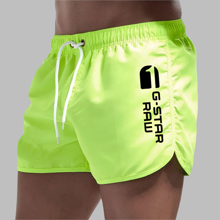 Solid color men's quick-dry swim trunks, comfortable beachwear and pool shorts for summer vacation.