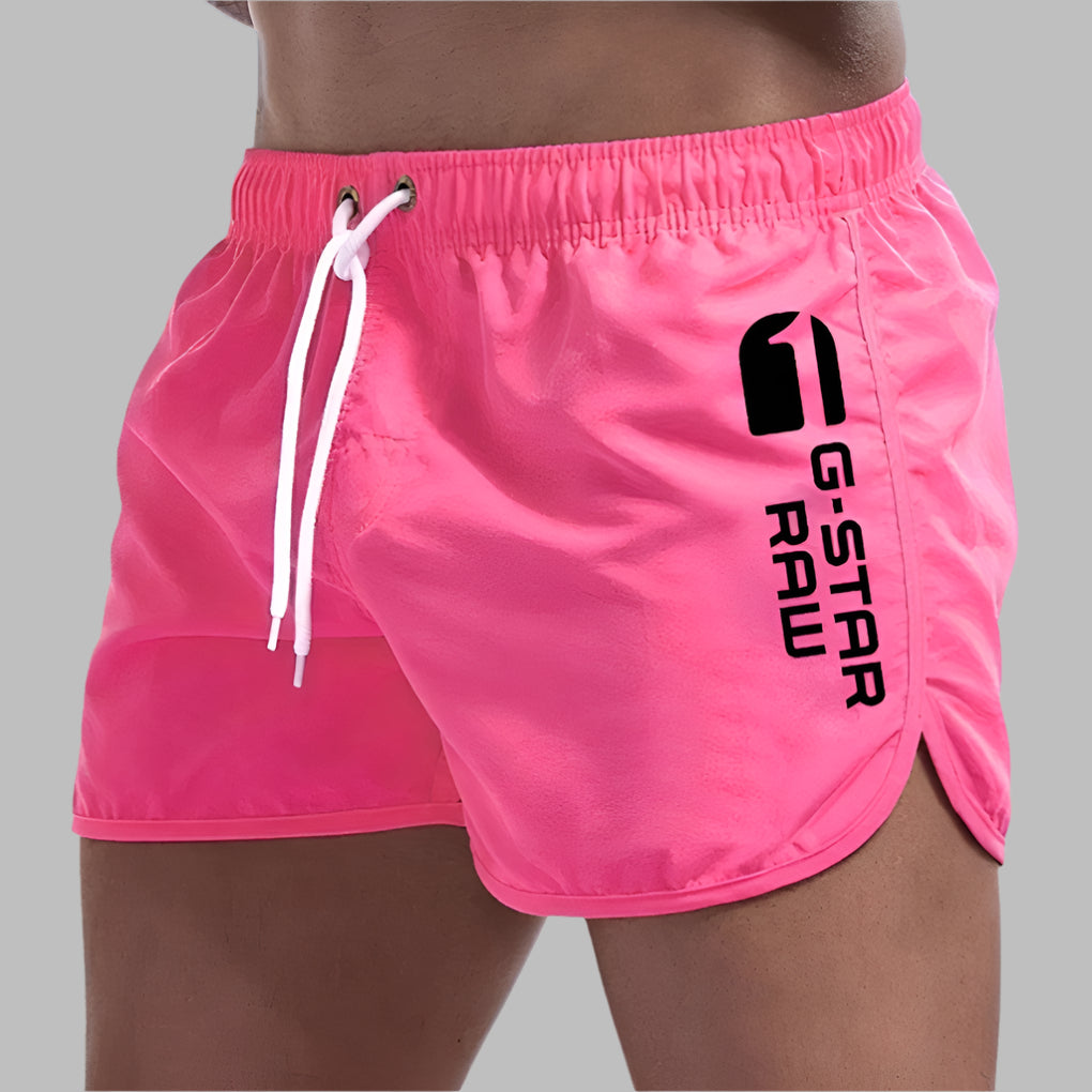 Versatile men's quick-dry swim trunks, great as casual beach shorts or active pool swimwear. Summer essential.