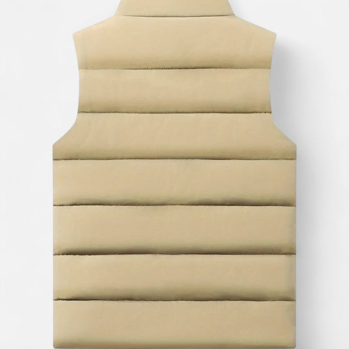 Sleek men's quilted sleeveless jacket, an essential warm outerwear piece for men this winter & autumn.