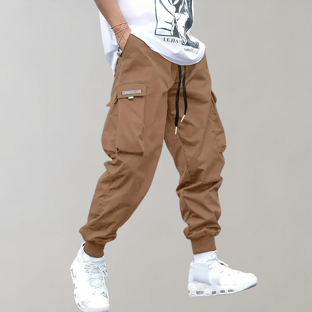 Men's relaxed fit cargo trousers with a comfortable drawstring waist, perfect for casual everyday wear.