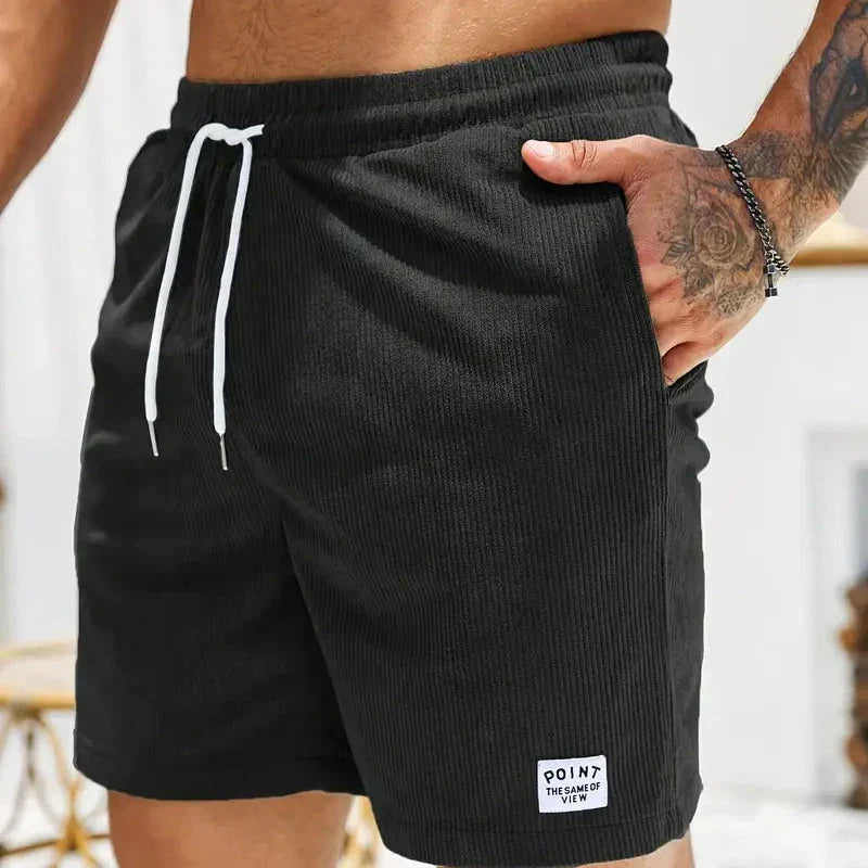 Stylish men's casual drawstring shorts, relaxed fit for versatile everyday wear.