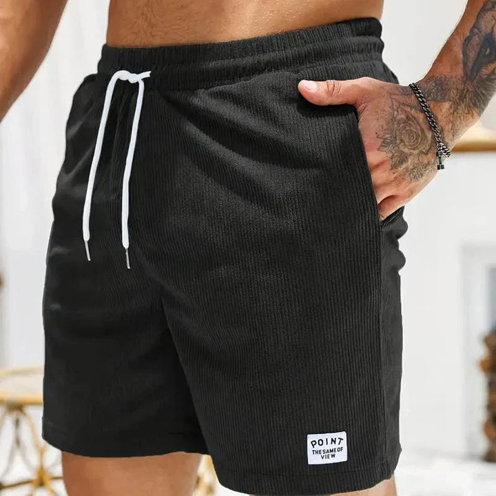 Stylish men's casual drawstring shorts, relaxed fit for versatile everyday wear.