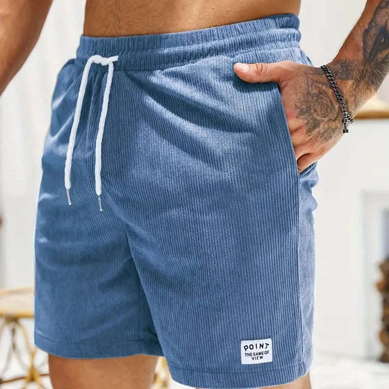 Men's relaxed fit shorts, drawstring design, perfect for casual summer activities.