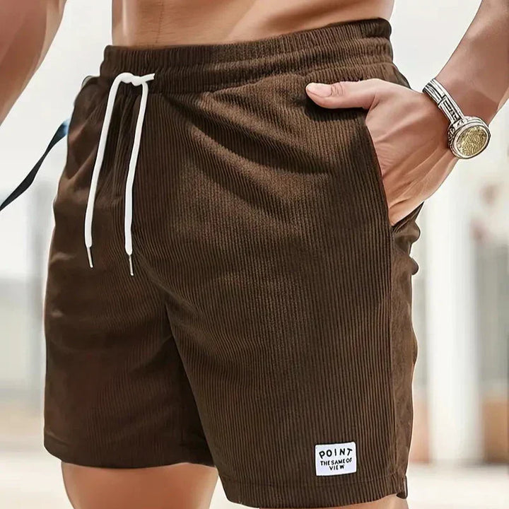 Men's casual bottoms: relaxed fit drawstring shorts, ideal for summer comfort.