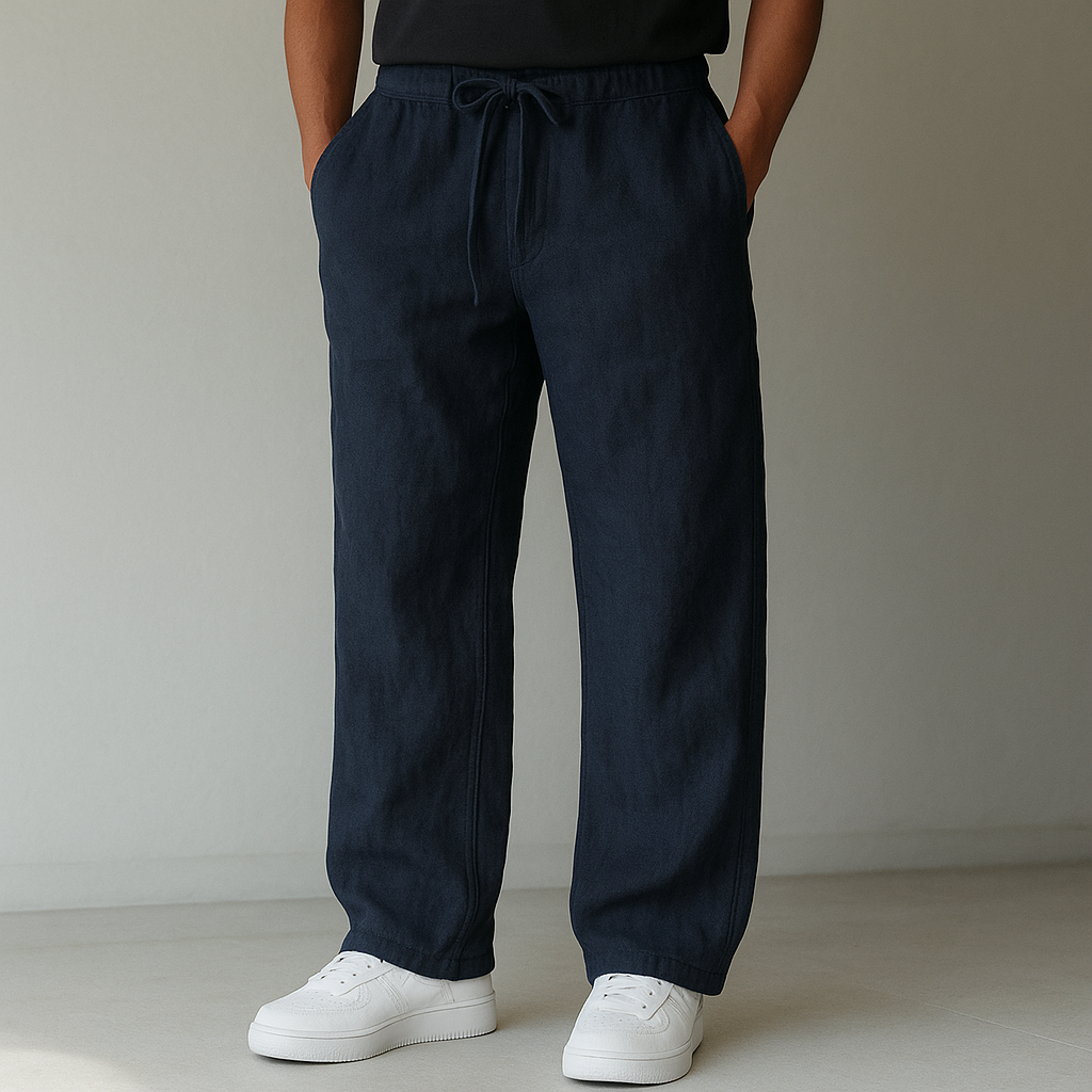 Men's relaxed fit linen trousers with a comfortable drawstring waist, perfect for casual summer wear.