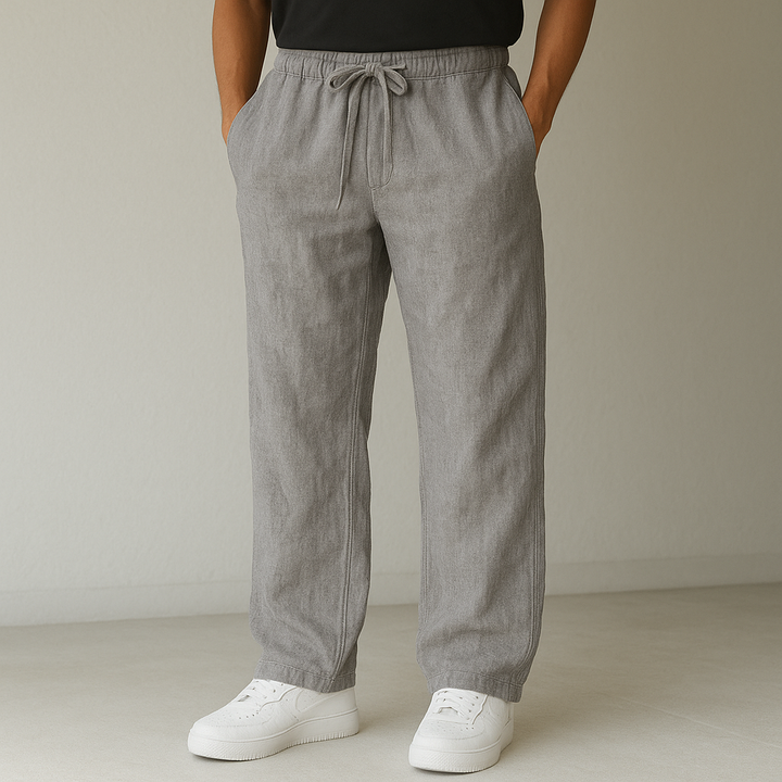 Men's Relaxed Linen Trousers featuring a practical drawstring waist for adjustable comfort.
