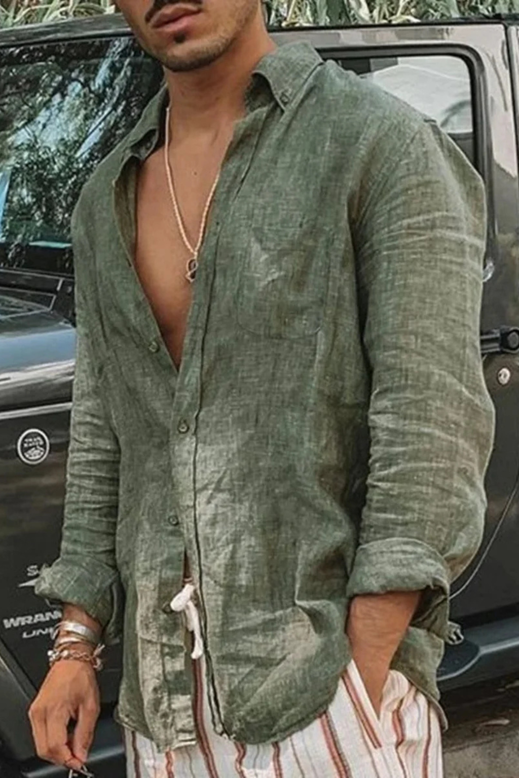 Green men's relaxed fit long sleeve button-down shirt, a versatile casual spring wardrobe essential.