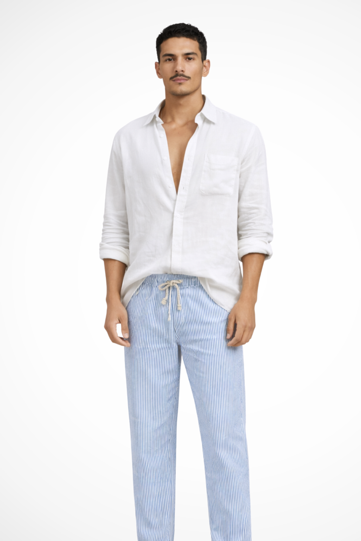 White men's long sleeve button-down shirt, relaxed fit, ideal for breathable summer fashion.