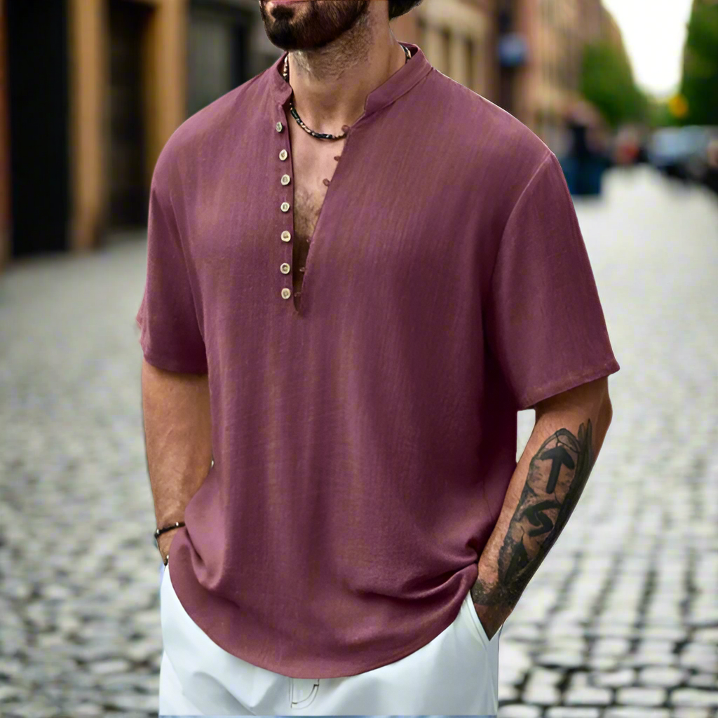 Versatile men's short sleeve, relaxed fit button neck shirt. Comfortable, breathable casual top for summer fashion.