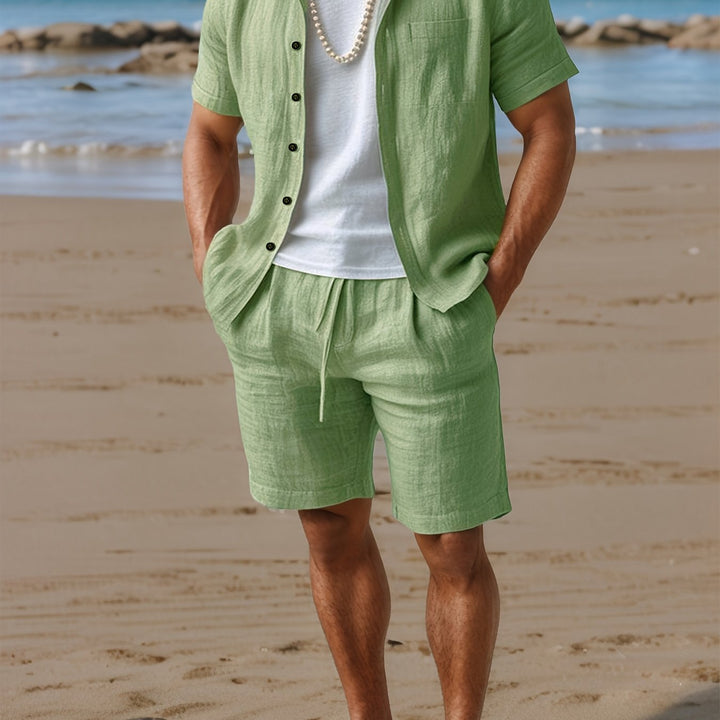 Men's comfortable linen-look summer shirt & shorts set, perfect for casual warm weather events.