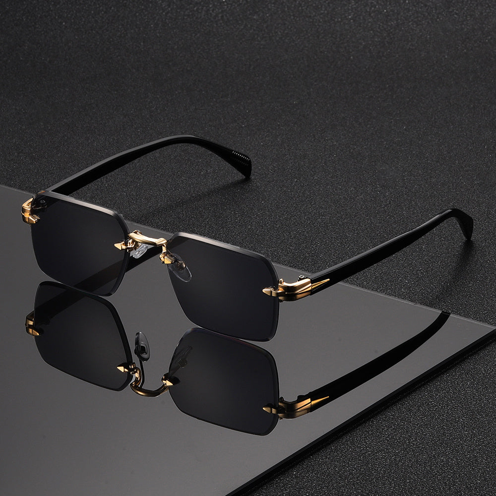 Elegant men's rimless square glasses with a sophisticated gold frame, perfect for a refined and modern aesthetic.