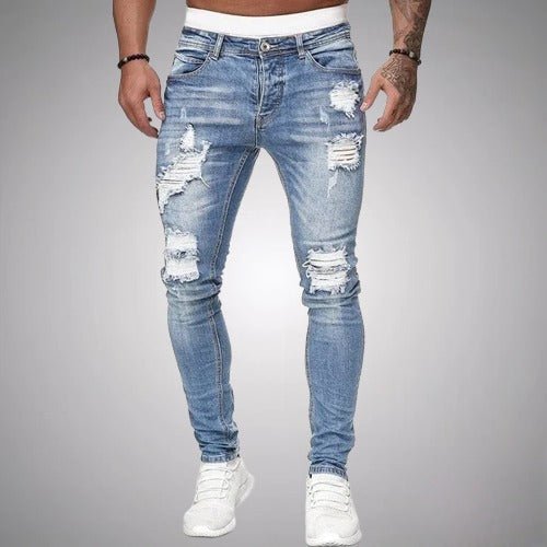 Comfortable men's slim fit stretch pants with stylish ripped detailing, perfect for modern casual wear.