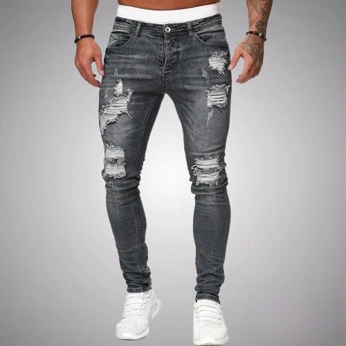 Stylish distressed men's ripped pants with a comfortable slim fit and stretch fabric for casual everyday style.