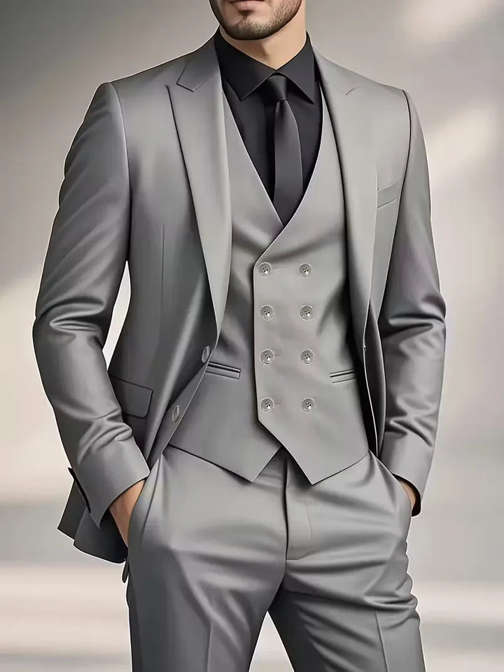 Men's slim fit double-breasted 3-piece suit, showcasing the waistcoat and jacket. Business-ready.