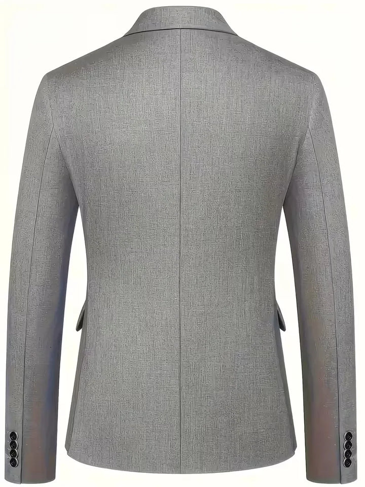 Professional men's attire: a slim fit double-breasted 3-piece suit with a complementary waistcoat.