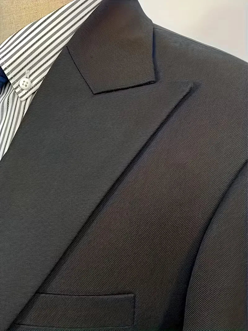 Sophisticated men's formal wear: a slim fit double-breasted 3-piece suit with a sharp waistcoat.