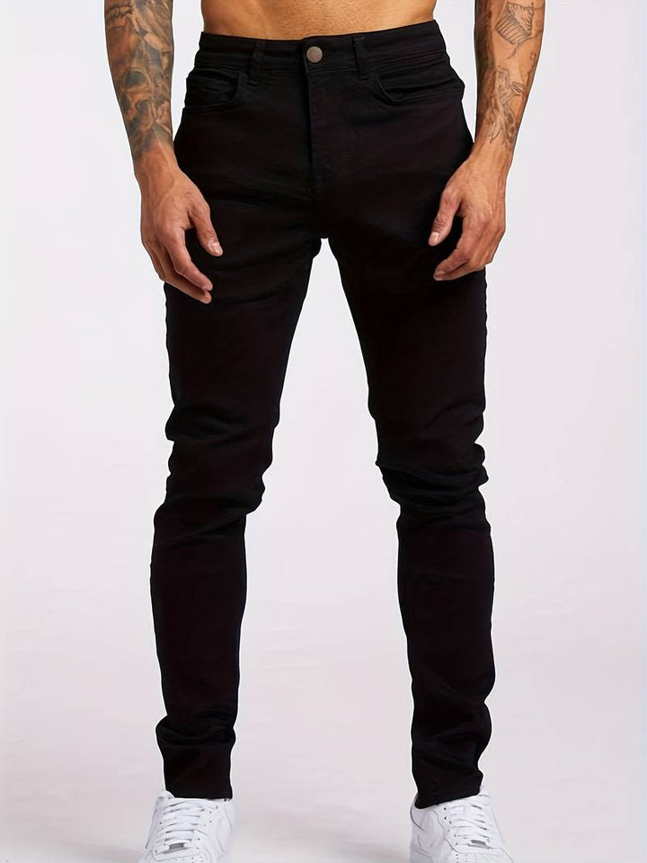 Casual men's slim fit jeans, ideal for streetwear fashion & everyday comfort with 5 pockets.