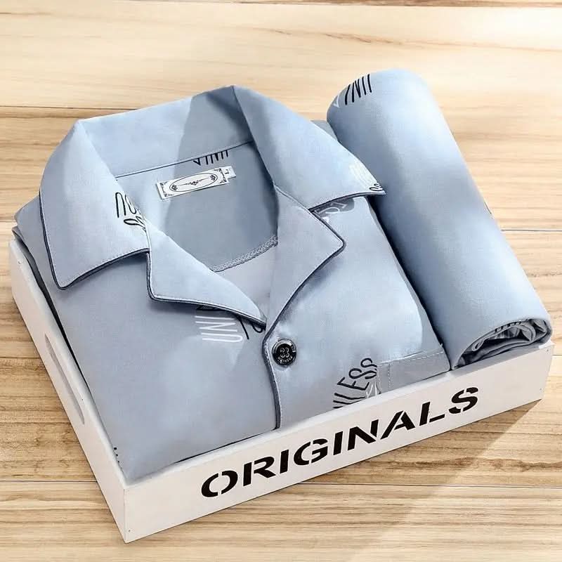 Premium soft & breathable men's two-piece pajama set. Button-up loungewear for superior comfort.
