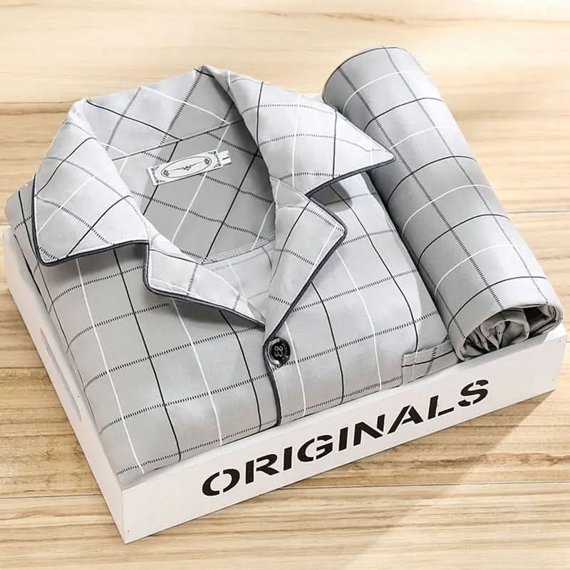 Luxuriously soft men's loungewear set. Breathable button-up pajamas for restful nights.