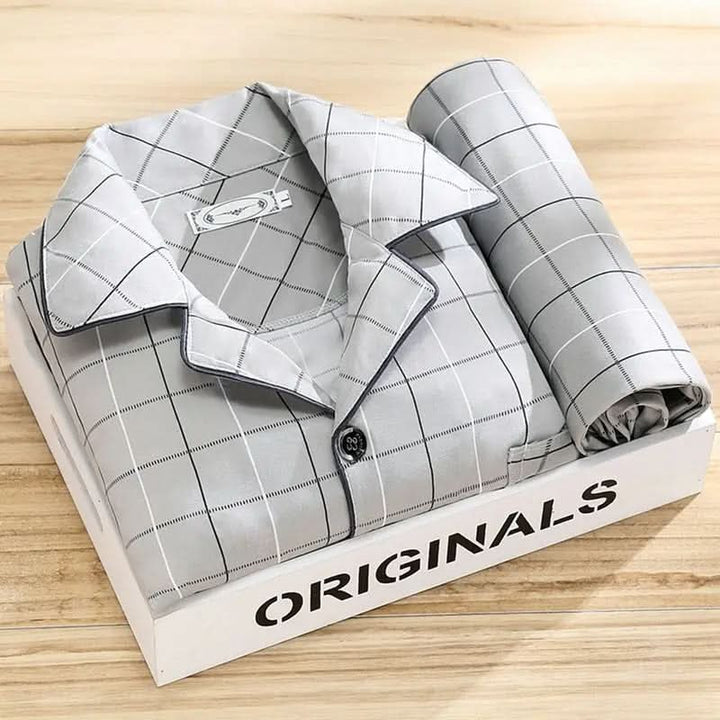 Luxuriously soft men's loungewear set. Breathable button-up pajamas for restful nights.