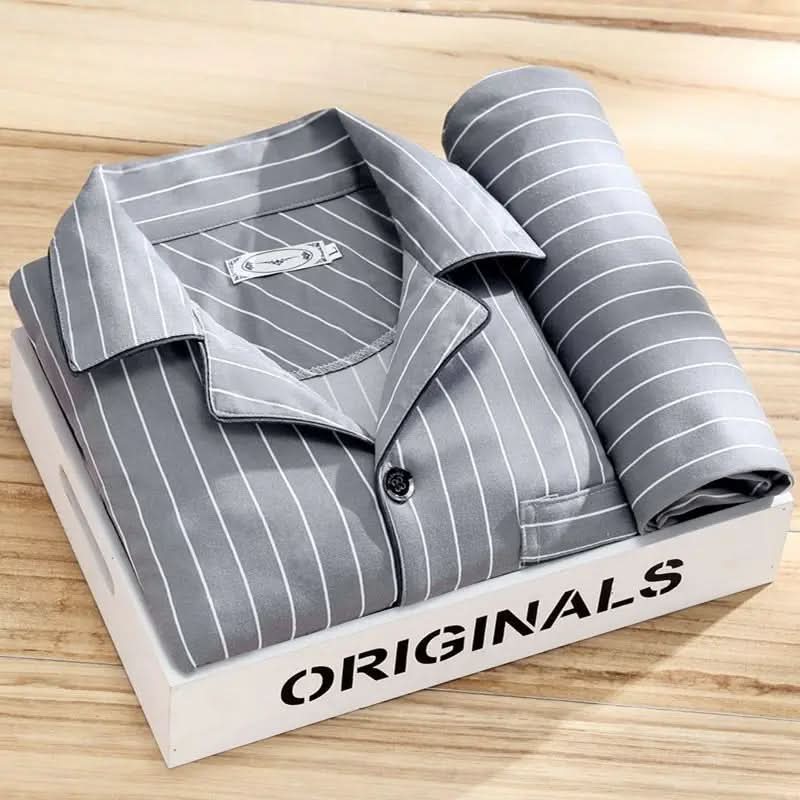Stylish button-up men's sleepwear set. Soft, breathable pajamas, perfect for comfortable nights.