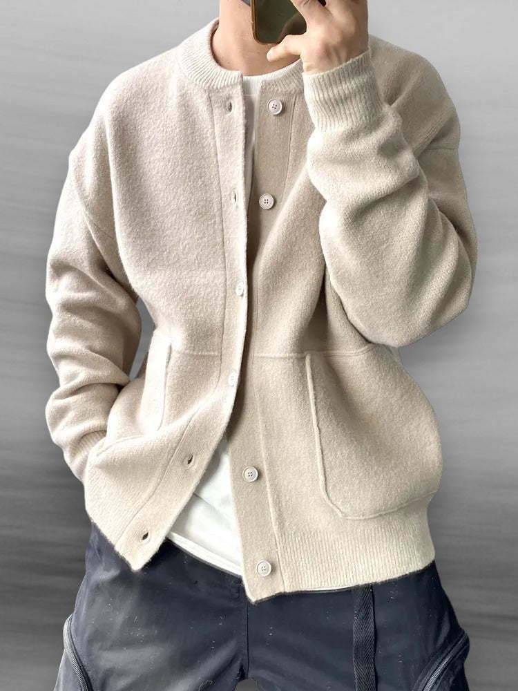 Versatile men's button-front cardigan. Soft, long-sleeve sweater, ideal for casual wear & layering.