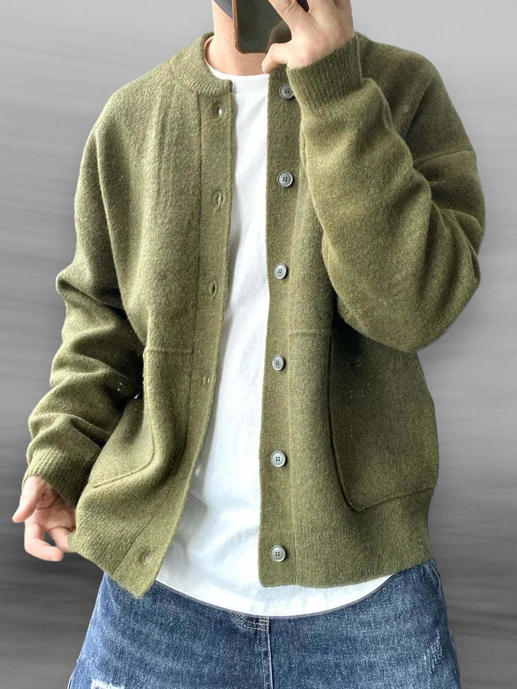 Comfortable men's button-front cardigan. Soft long-sleeve sweater, a stylish layering piece for winter outfits.