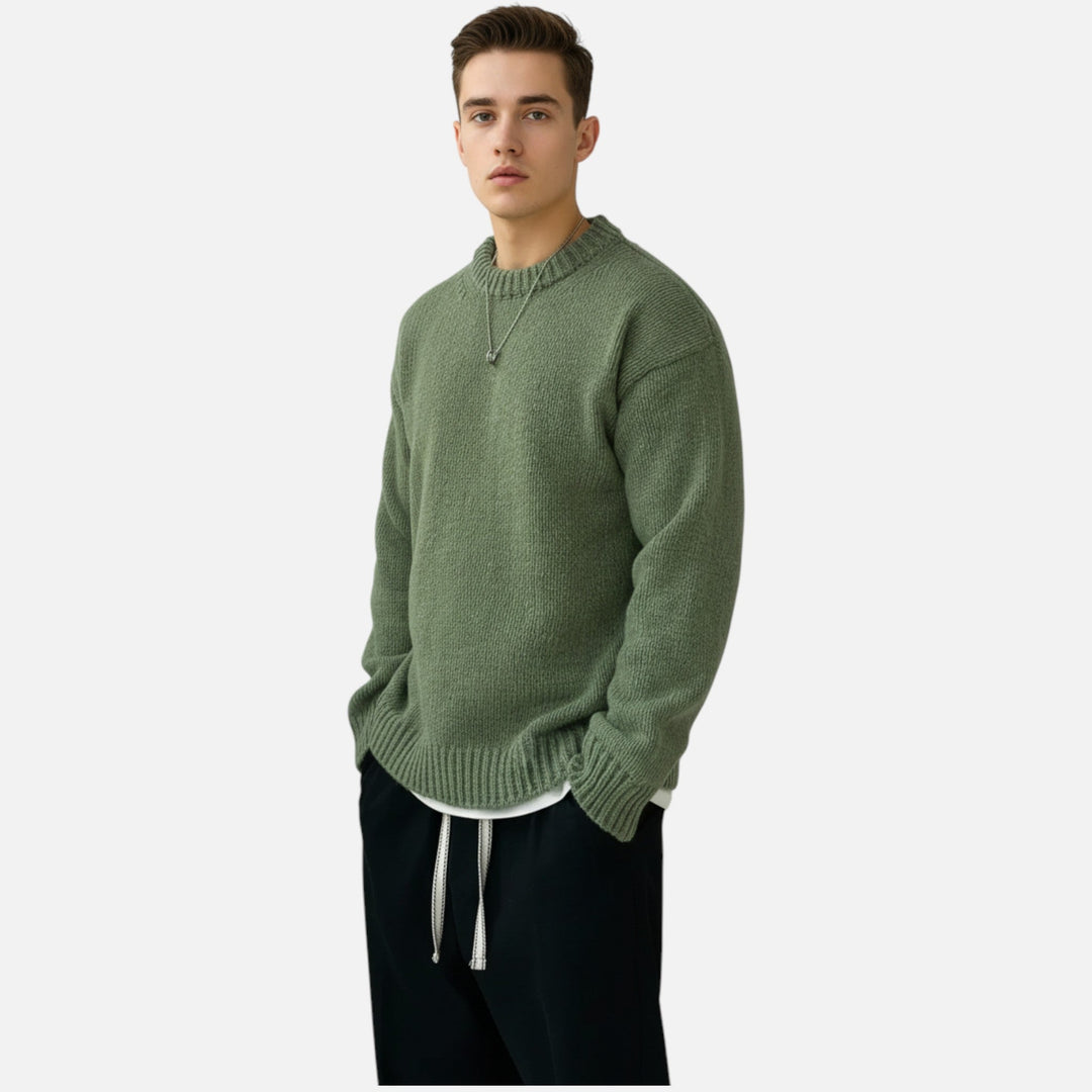 Comfortable men's solid crew neck sweater, ideal for versatile fall and winter layering. Elegant casual wear.