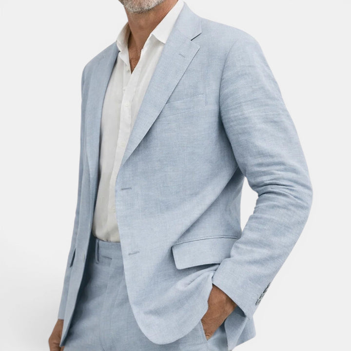 Elegant men's blue regular fit two-piece suit set. Tailored blazer & pants perfect for business & events.