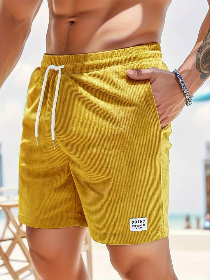 Comfortable men's athletic swim shorts for active beach days, watersports, and casual summer wear. Quick-dry.
