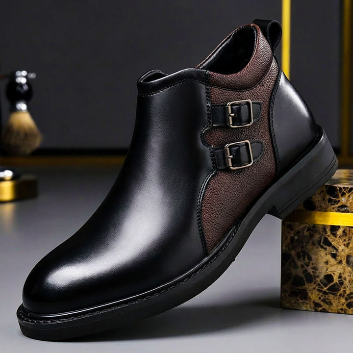 Brown men's ankle boots with double buckle straps, offering a smart casual look and comfort.