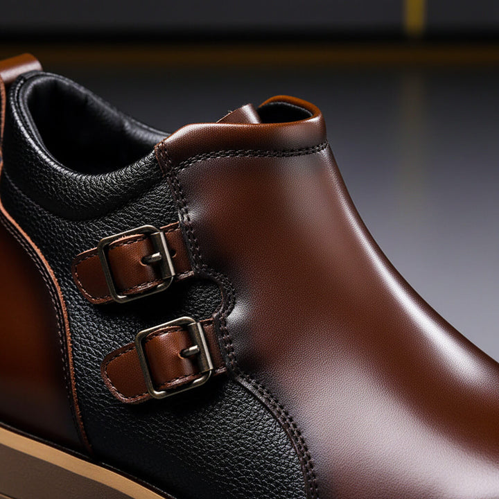 Black men's buckle ankle boots with dual straps, versatile for dressy or everyday stylish wear.