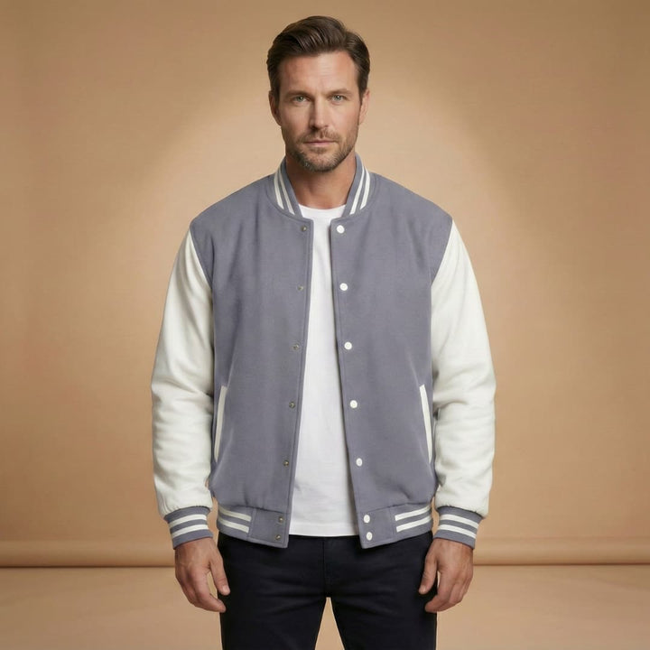 High-quality men's bomber jacket with a snap closure, ribbed cuffs & hem, and functional pockets for a modern look.