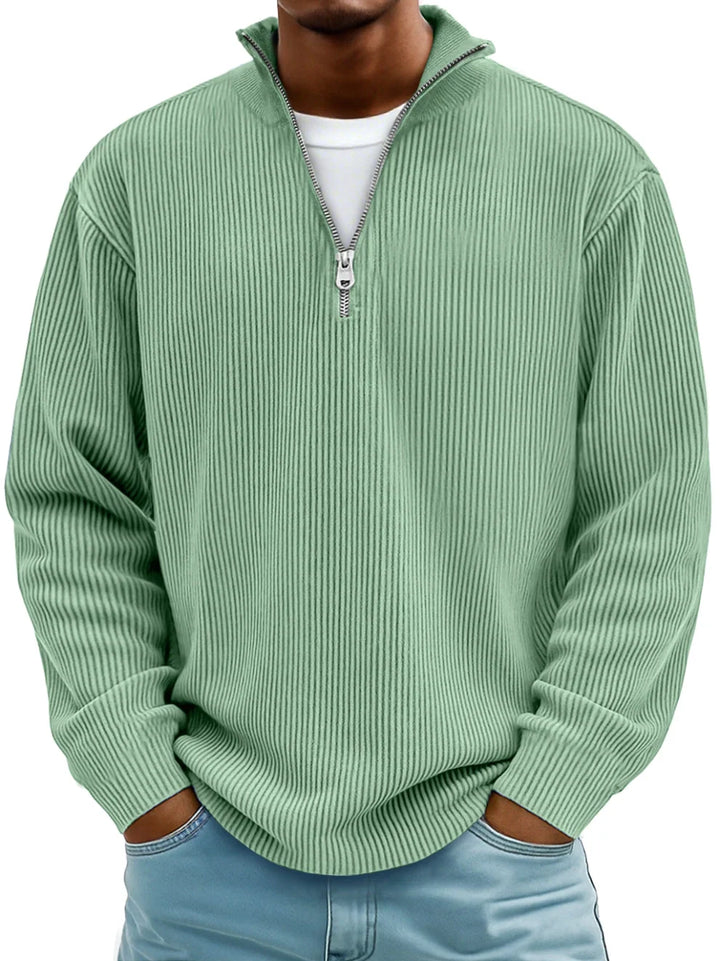 Close-up of a men's half-zip ribbed sweater, highlighting the quality knit and casual fit.