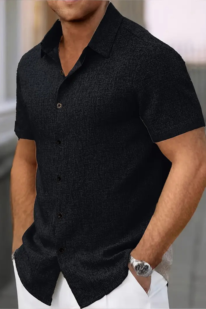 Collared men's casual shirt with short sleeves, a stylish and comfortable choice for summer and warm days.