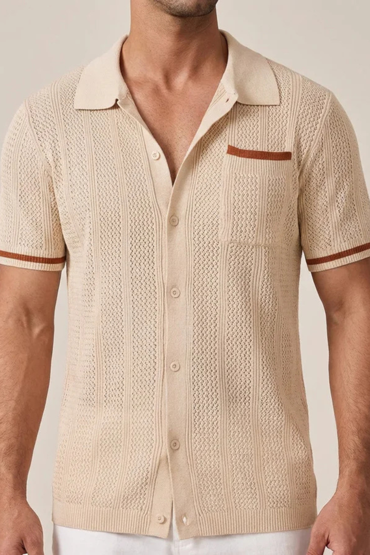 Relaxed fit men's short sleeve camp collar shirt with textured design and front buttons.