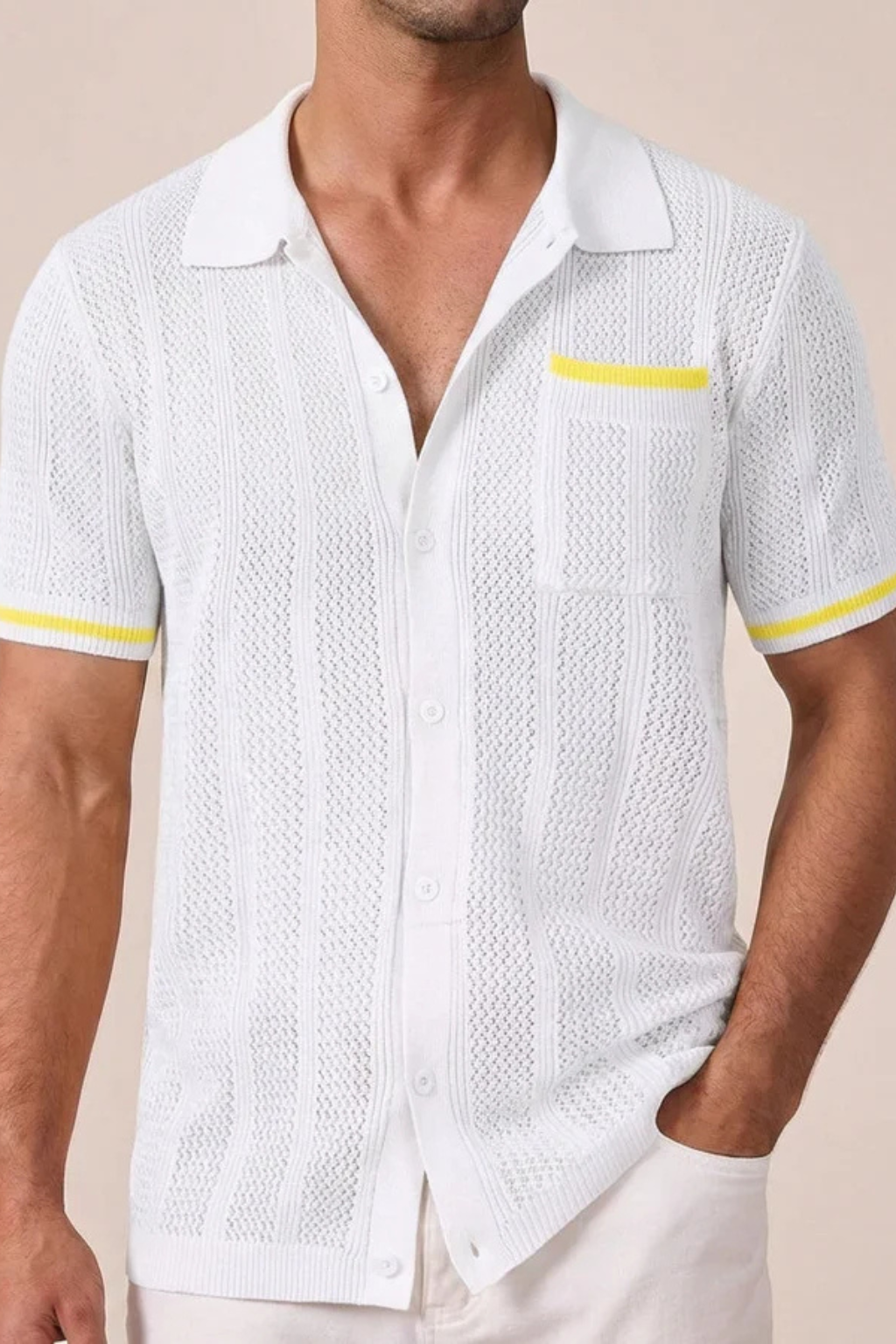 Trendy men's short sleeve button-front shirt. Features a classic camp collar for a casual look.