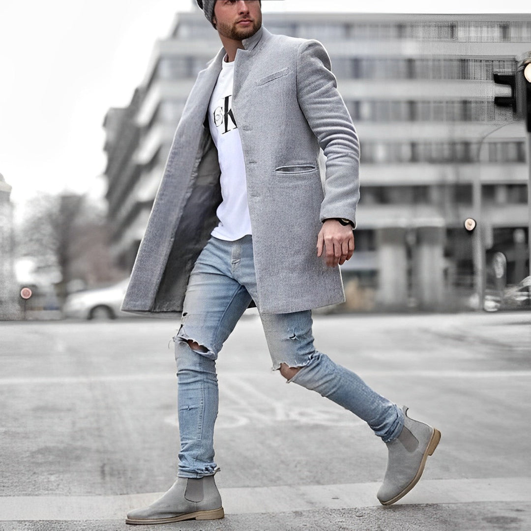 Men's stylish slim-fit mid-length overcoat with a modern stand collar. Perfect for winter formal or casual wear.