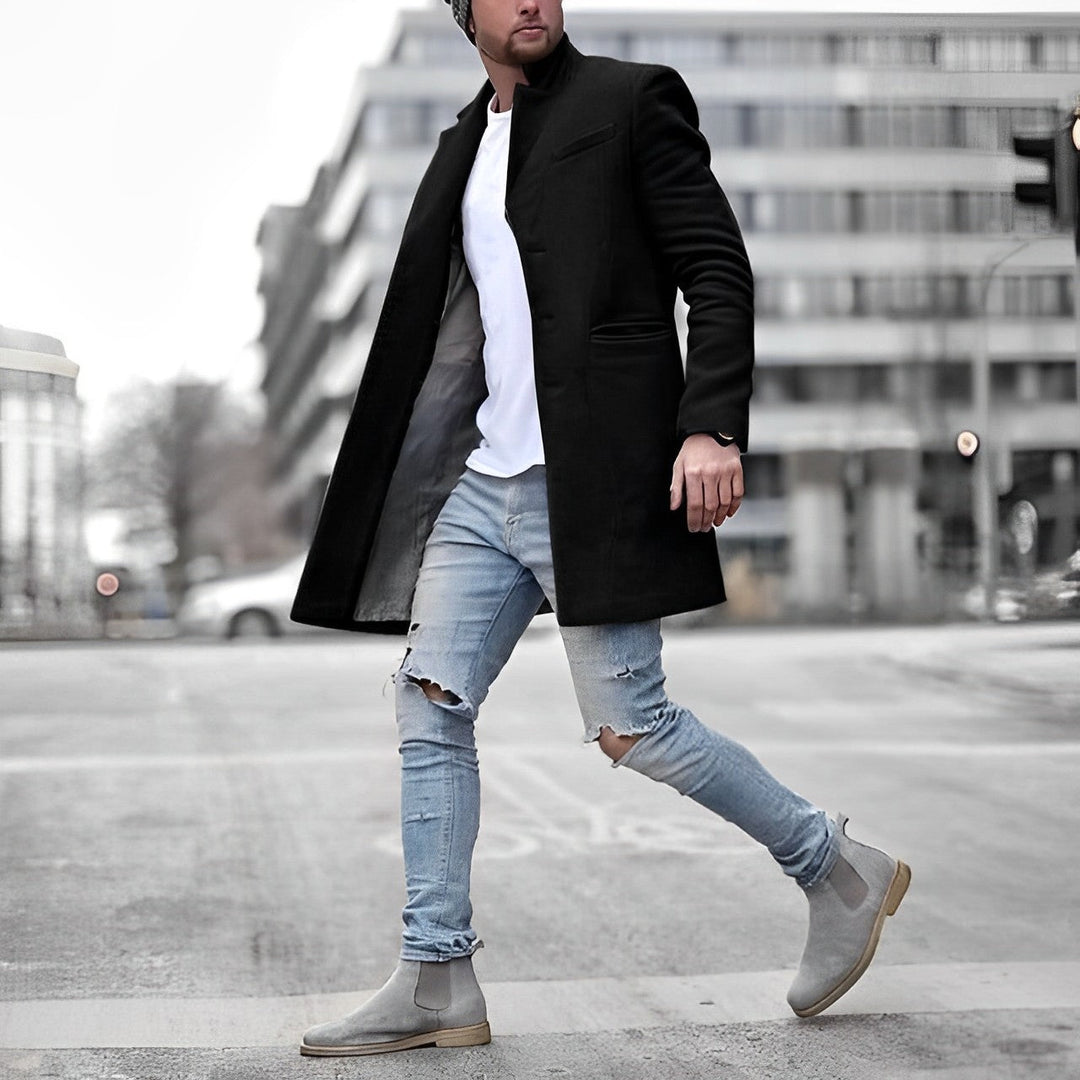 Modern men's mid-length slim-fit winter overcoat. Features a sleek stand collar, ideal for stylish outerwear.