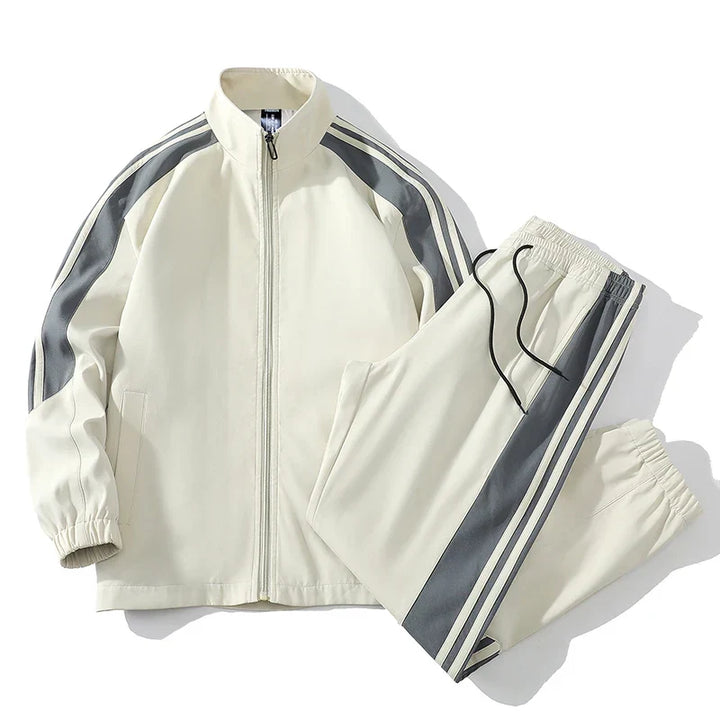 Men's stylish two-piece tracksuit with full zip jacket and comfortable joggers, ideal for casual wear.