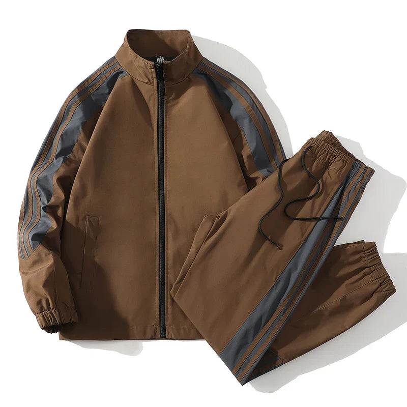 Comfortable men's activewear tracksuit, complete with a full zip jacket and matching jogger pants.
