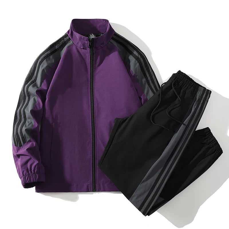 Modern men's casual two-piece tracksuit, including a full zip top and stylish jogger bottoms.