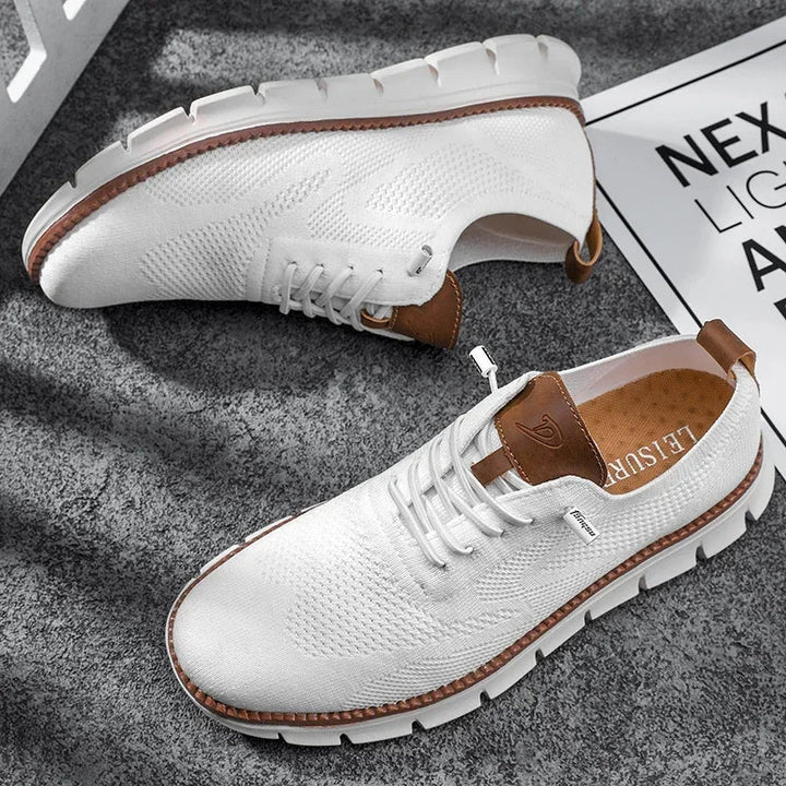 Men's summer lace-up trainers, breathable for comfort, with a striking chunky sole design.